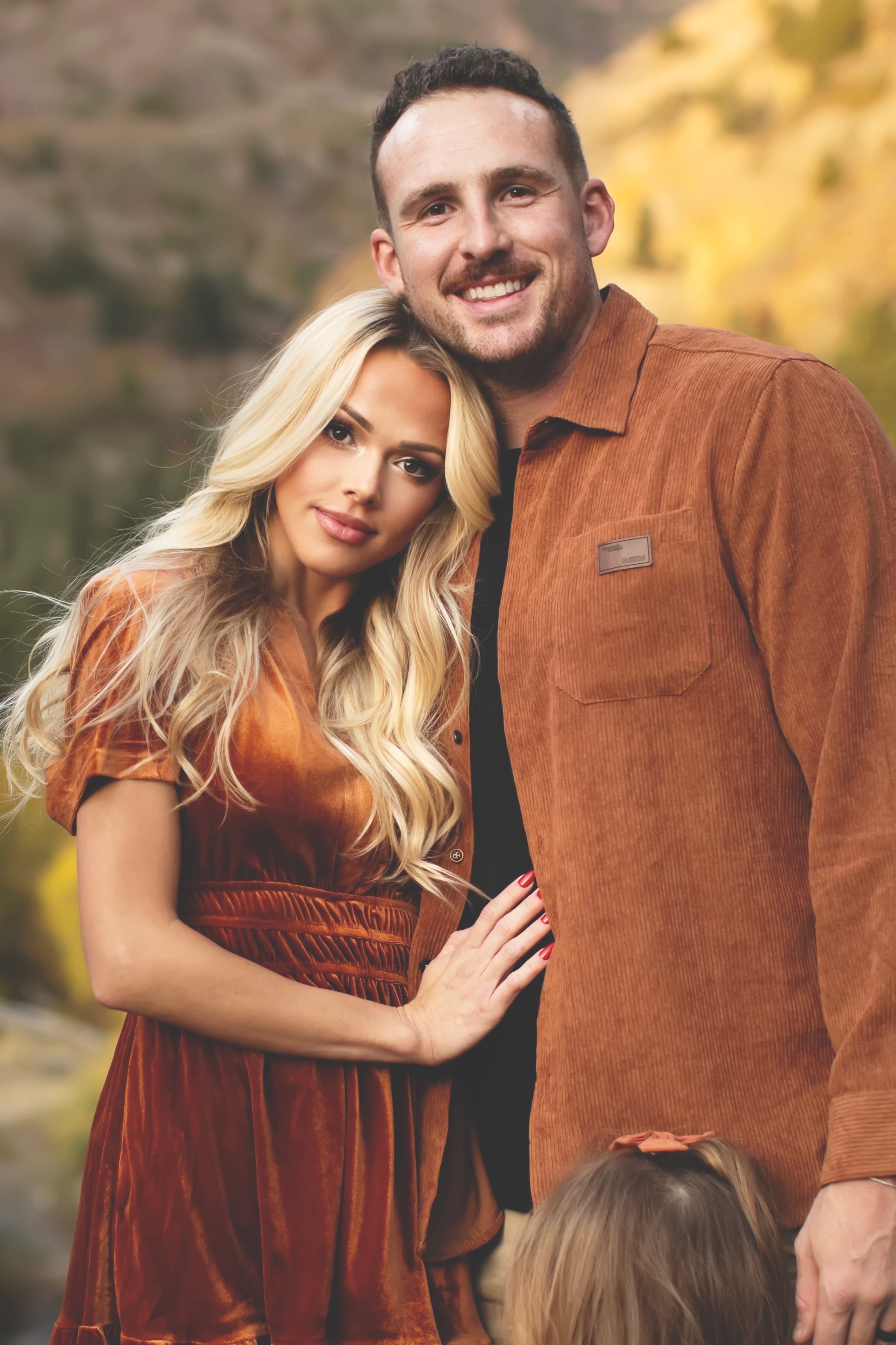 Clint Berhow, founder of Berhomes LLC, with his wife in the Utah mountains